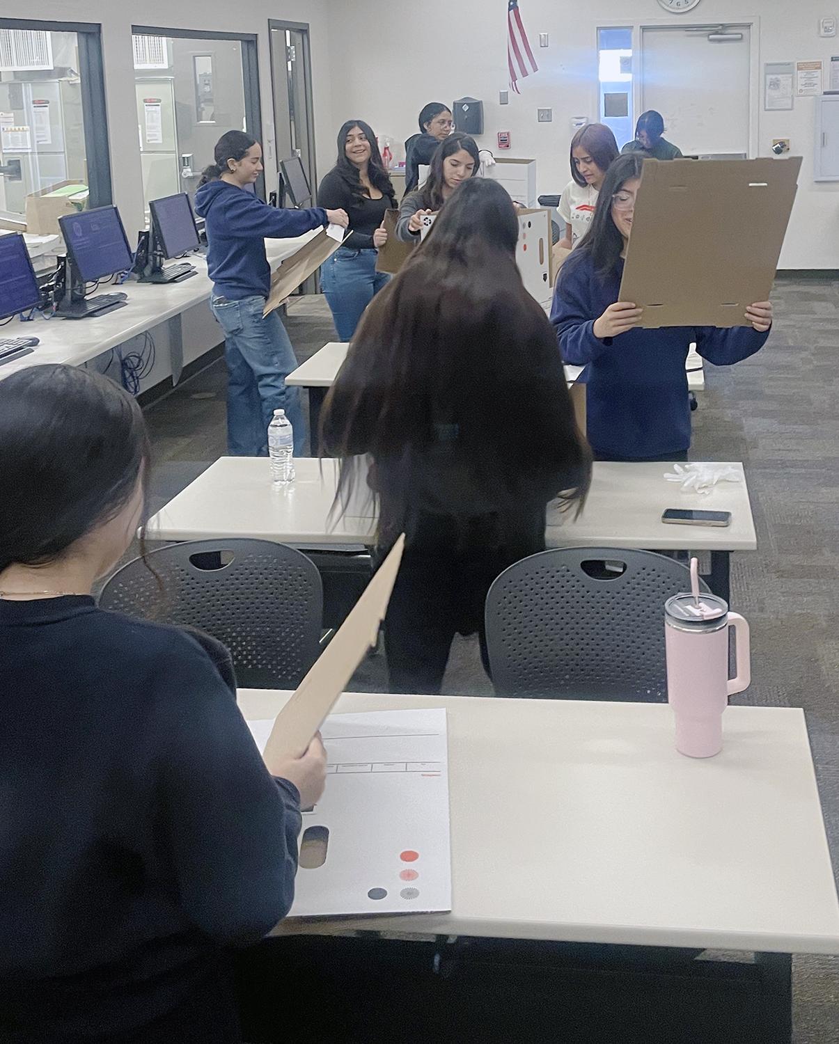 students working with the material